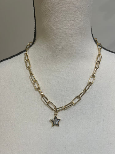Christie Black and Gold Star